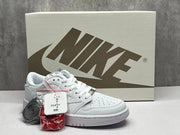 Jordan 1 Low White Sneaker with Swoosh Detail