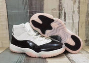 Jordan 11 High-Top Sneakers in White and Black