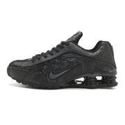Nike Shox R4 All-Black Embossed Sneakers