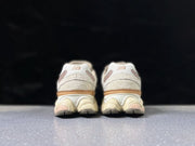 New Balance 9060 U9060CWF Sneakers in Cream and Pink