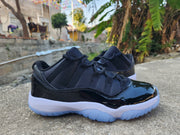 Air Jordan 11 Low Black and White Sneakers