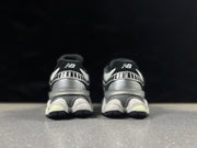 New Balance 9060SP Sneakers in Silver, White and Black
