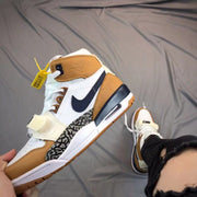 Air Jordan Legacy 312 High-Top Sneakers in White and Tan
