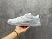 Jordan 1 Low White Sneaker with Swoosh Detail