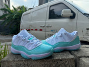 Jordan 11 Low White and Light Green Sneakers