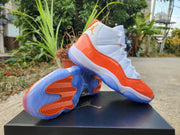 Jordan 11 White and Orange High-Top Sneakers