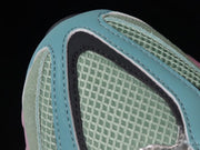 New Balance 9060 WRB Sneakers in Mint and Pink