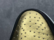 Jordan 1 High Black and Gold Sneakers