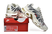 Nike Air Max Plus Sneakers in White and Gray
