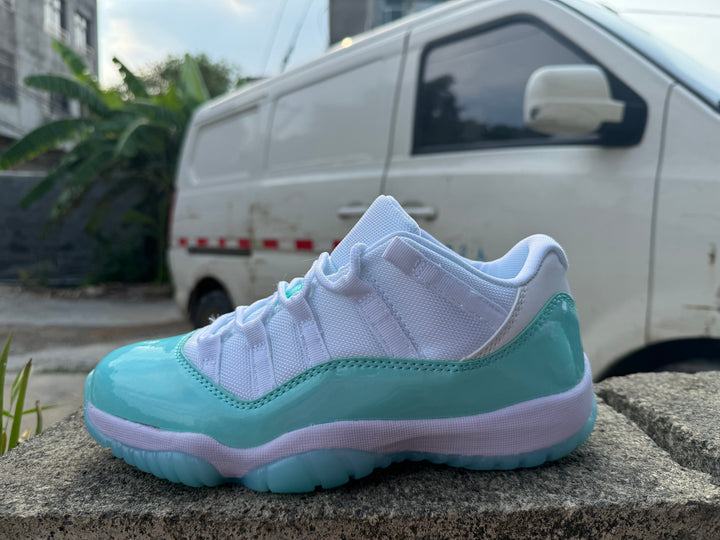 Jordan 11 Low White and Light Green Sneakers
