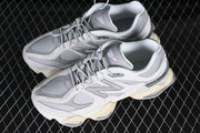 New Balance U9060GM Sneakers in Grey and Lavender