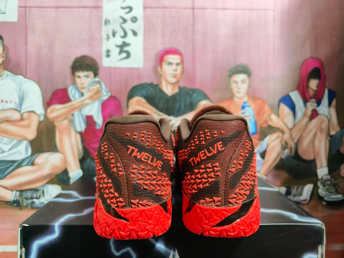 Nike Red Basketball Sneakers with Black and Orange Details