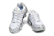 Nike Shox TL Sneakers in White and Metallic Silver