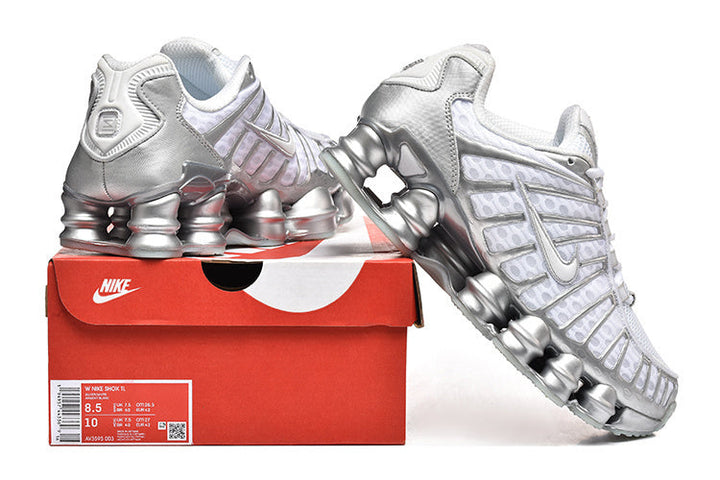 Nike Shox TL Sneakers in White and Metallic Silver