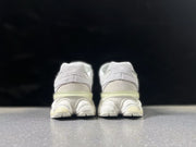 New Balance U9060ERB Sneakers in White and Pale Yellow